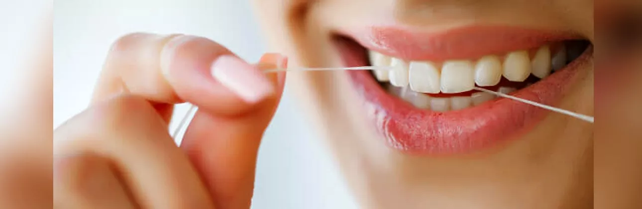 Correct flossing technique demonstrated — how to floss your teeth properly